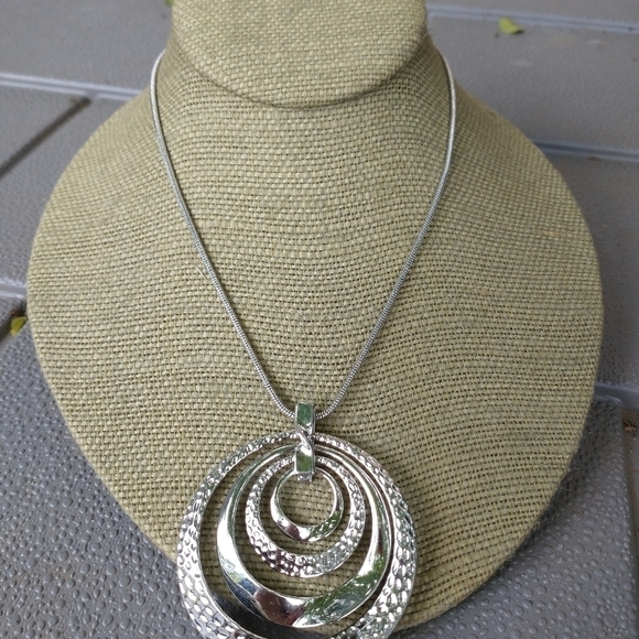 Women's silver tone runway statement necklace. - Picture 2 of 5